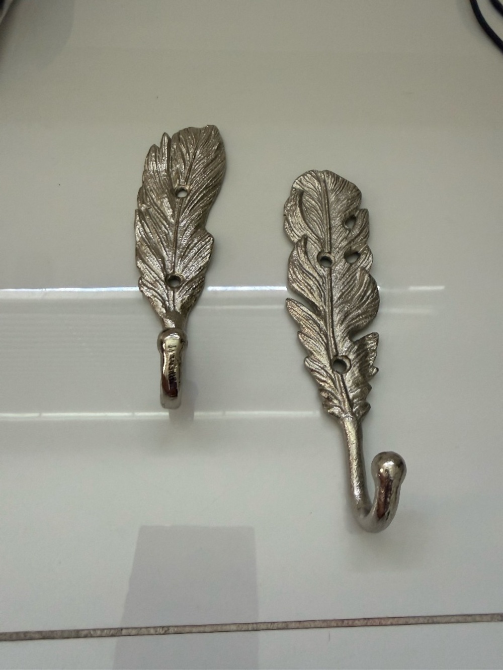2 Silver feather Hooks